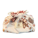 naturel/katoen buideltasje met India print en een kleurrijke gestreepte fluwele voering. De rijke print en mooie afwerking geven de pouch een luxe, bijzondere uitstraling.