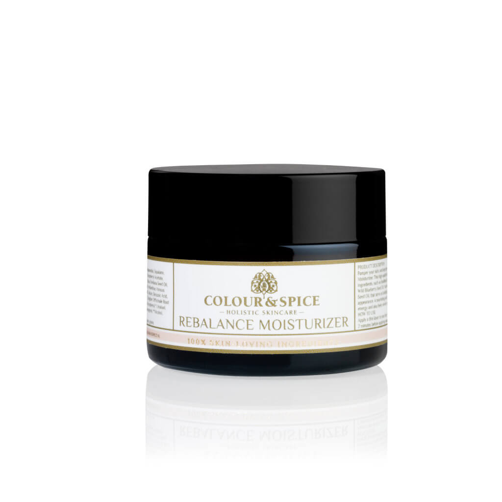 50 ml bruin glazen pot Rebalance Moisturizer van Colour&Spice, holistisch huidverzorgingsproduct met een zwarte deksel en een verfijnd, goed ontworpen etiket, natuurlijke dagcreme, geformuleerd om te voeden en revitaliseren.